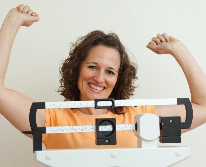 woman celebrating weight loss